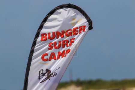 Photo for Gilgo Beach, New York, USA - 25 July 2023: Bunger Surf Camp sign at Gilgo Beach on Long Island. - Royalty Free Image
