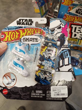 Photo for Istanbul, Turkey - December 31, 2023: A Hot Wheels Skate, Star Wars Stormtroopers themed on a hand in a toy store. - Royalty Free Image