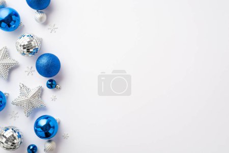 Photo for Christmas Eve concept. Top view photo of blue white silver baubles disco ball glowing star ornaments and snowflake shaped confetti on isolated white background with blank space - Royalty Free Image
