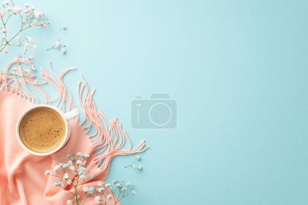 Hello spring concept. Top view photo of cup of hot frothy drinking gypsophila flowers and pink scarf on isolated pastel blue background with copyspace
