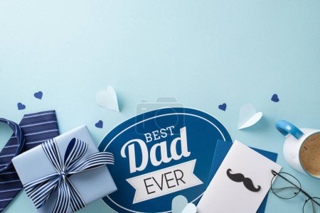 Photo for Classy Father's Day concept. Flat lay top view arrangement of card, giftbox, necktie, spectacles, paper hearts, and coffee mug on pastel blue background with empty space for copy - Royalty Free Image