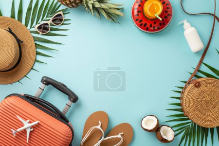 Summer party theme. Top view suitcase, tiny plane model, pool accessories, glasses, hat, sunscreen, flip-flops, rubber ring, cocktail, fruits, palm leaves on light blue backdrop, frame for text or ad