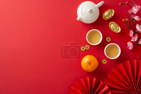 Photo for Thai-Chinese New Year Customs: top view tea ceremony display with Feng Shui items, fragrant jasmine tea symbolizing family unity in traditional celebration. Tangerine and sakura complete festive scene - Royalty Free Image