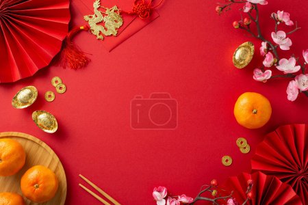 Photo for Get glimpse of festive fervor with top view photograph showcasing fans, traditional coins, sycee, Hong Bao, wall hanging, tangerines, sakura on red backdrop, creating space for your text or promotion - Royalty Free Image