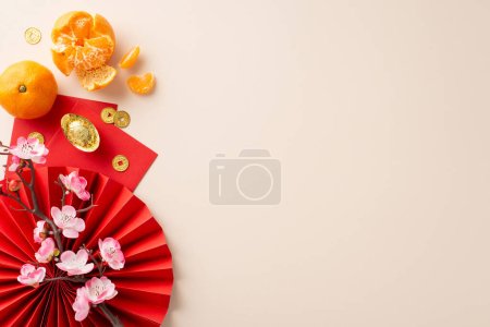 Photo for Ignite the New Year festivities with this charming composition. Top-down view of red fan, feng shui adornments, lucky coins, red envelopes, peeled tangerines on neutral background with space for text - Royalty Free Image