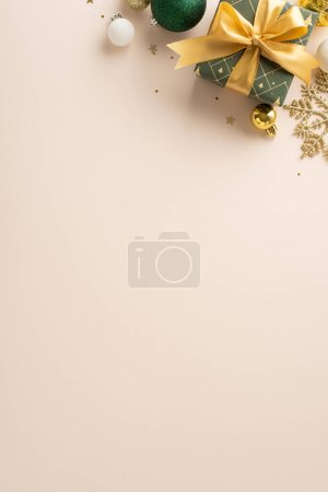 Photo for Luxurious New Year concept with touch of creativity. Top-view vertical image showcases ribbon-decorated gift, lavish baubles, snowflake detail, glistening sequins against light backdrop, space for ads - Royalty Free Image