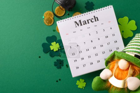 Photo for Festive calendar layout with St. Paddy's elements: top view leprechaun toy, magic pot of gold coins, trefoils, and confetti. Perfect for event planning on a vibrant green backdrop - Royalty Free Image