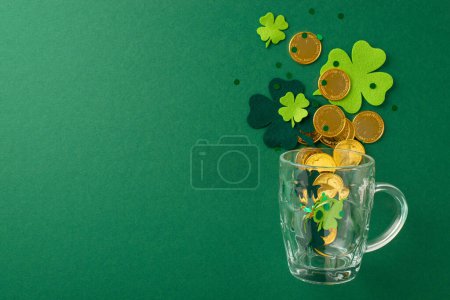 Photo for Raise a toast on St. Paddy's! Top view image showcases a beer glass with gold coins, trefoils, confetti, and beads on a vibrant green background. Leave space for your text or advertisement - Royalty Free Image