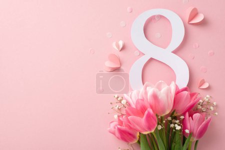 Observing Women's Day. From top view, see the number 8, a generous arrangement of tulips plus gypsophila, confetti, and hearts on a muted pink setting, with a spot for your copy