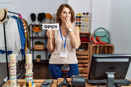 Photo for Middle age woman holding banner with open text at retail shop covering mouth with hand, shocked and afraid for mistake. surprised expression - Royalty Free Image