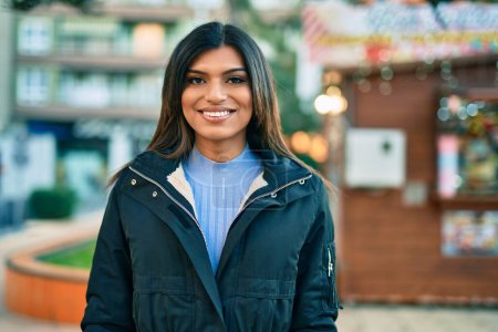 Photo for Beautiful hispanic woman smiling confient at the city - Royalty Free Image