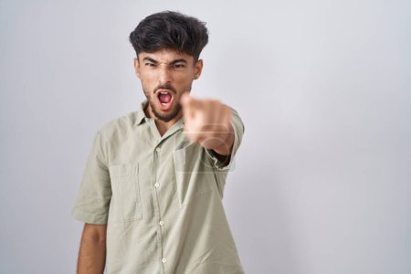 Photo for Arab man with beard standing over white background pointing displeased and frustrated to the camera, angry and furious with you - Royalty Free Image