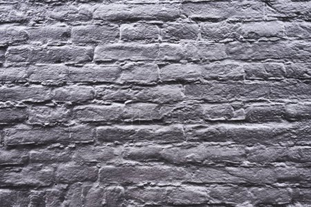 Téléchargez les photos : Texture d'un mur de briques noires - en image libre de droit
