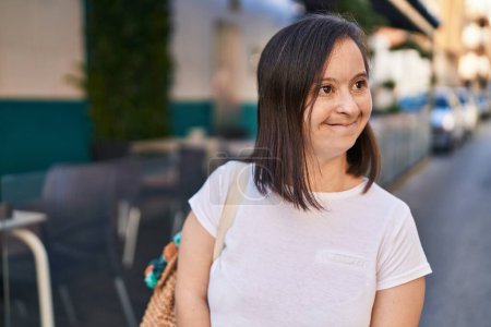 Photo for Down syndrome woman smiling confident standing at street - Royalty Free Image