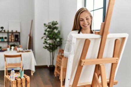 Photo for Young caucasian woman smiling confident drawing at art studio - Royalty Free Image