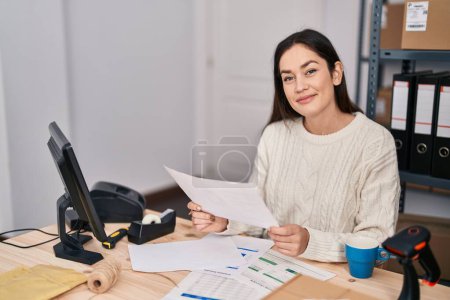 Photo for Young woman ecommerce business worker working at office - Royalty Free Image