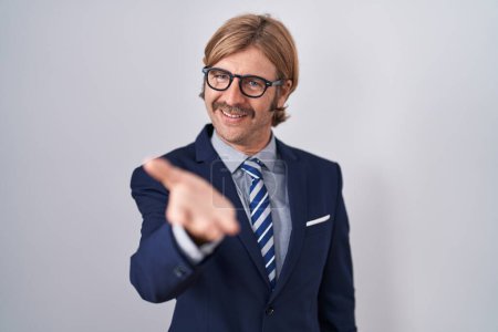 Photo for Caucasian man with mustache wearing business clothes smiling cheerful offering palm hand giving assistance and acceptance. - Royalty Free Image
