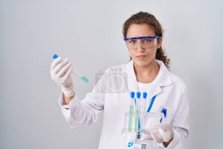 Photo for Young caucasian scientist woman working with laboratory samples skeptic and nervous, frowning upset because of problem. negative person. - Royalty Free Image