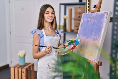 Photo for Adorable girl artist smiling confident drawing at art studio - Royalty Free Image