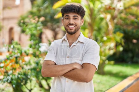 Photo for Young arab man smiling confident standing with arms crossed gesture at park - Royalty Free Image