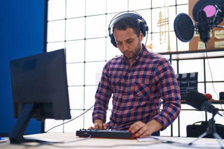 Photo for Young man musician having dj session at music studio - Royalty Free Image