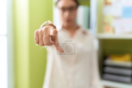 Téléchargez les photos : Young arab woman business worker pointing with finger to the camera at office - en image libre de droit