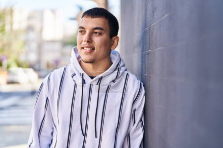 Photo for Young man smiling confident standing at street - Royalty Free Image