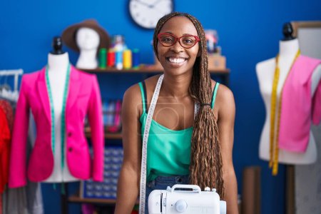 Photo for African american woman tailor smiling confident standing at atelier - Royalty Free Image