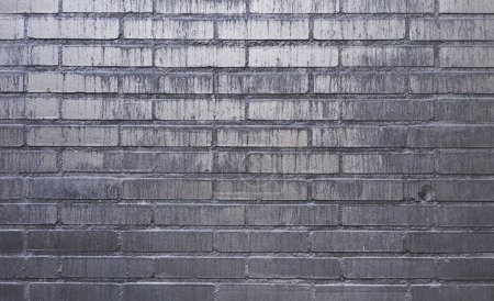 Téléchargez les photos : Texture d'un mur de briques noires - en image libre de droit