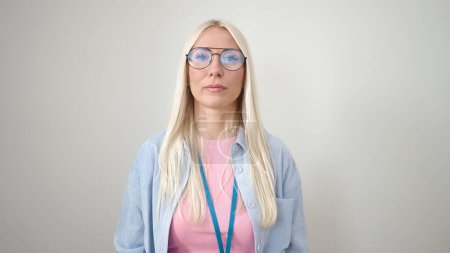Téléchargez les photos : Young blonde woman wearing glasses with relaxed expression over isolated white background - en image libre de droit