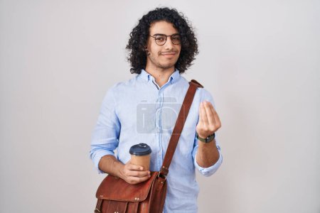 Téléchargez les photos : Hispanic man with curly hair drinking a cup of take away coffee doing money gesture with hands, asking for salary payment, millionaire business - en image libre de droit