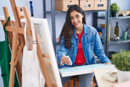 Photo for Young hispanic girl artist smiling confident drawing at art studio - Royalty Free Image