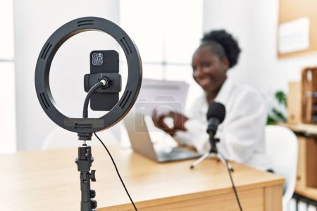 Photo for Young african american woman business worker having video call at radio studio - Royalty Free Image