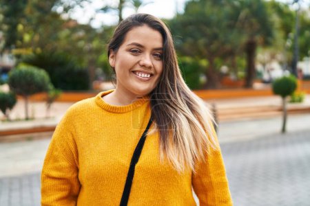 Photo for Young beautiful plus size woman smiling confident standing at street - Royalty Free Image