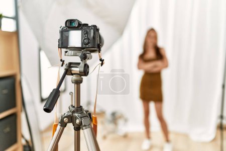 Photo for Young caucasian woman model having photo shooting photo studio - Royalty Free Image