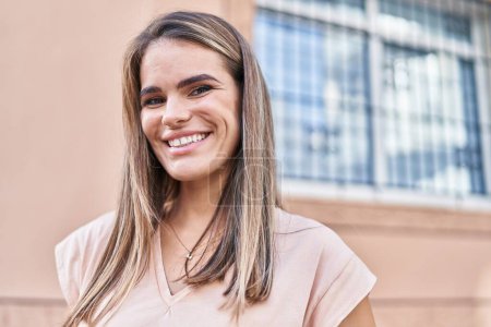 Photo for Young beautiful hispanic woman smiling confident standing at street - Royalty Free Image