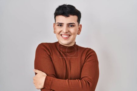 Photo for Non binary person wearing make up standing over isolated background happy face smiling with crossed arms looking at the camera. positive person. - Royalty Free Image