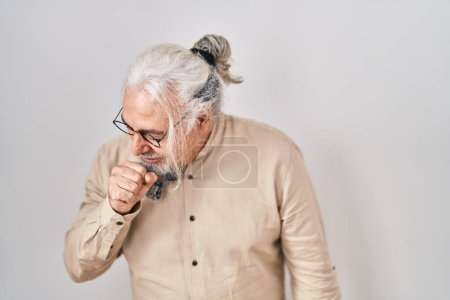 Photo for Middle age man with grey hair standing over isolated background feeling unwell and coughing as symptom for cold or bronchitis. health care concept. - Royalty Free Image