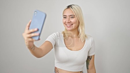 Photo for Young beautiful hispanic woman smiling confident make selfie by smartphone over isolated white background - Royalty Free Image
