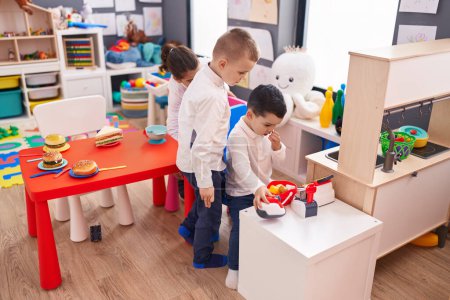 Photo for Group of kids students playing supermarket game sitting on table at kindergarten - Royalty Free Image