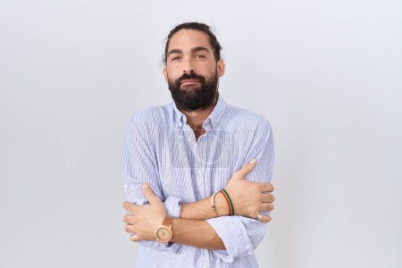 Photo for Hispanic man with beard wearing casual shirt shaking and freezing for winter cold with sad and shock expression on face - Royalty Free Image