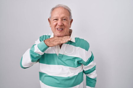 Photo for Senior man with grey hair standing over white background cutting throat with hand as knife, threaten aggression with furious violence - Royalty Free Image