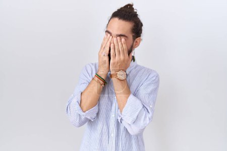 Photo for Hispanic man with beard wearing casual shirt rubbing eyes for fatigue and headache, sleepy and tired expression. vision problem - Royalty Free Image
