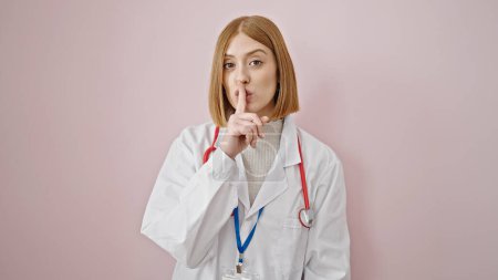 Photo for Young blonde woman doctor asking for silent over isolated pink background - Royalty Free Image