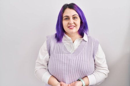 Photo for Plus size woman wit purple hair standing over white background with hands together and crossed fingers smiling relaxed and cheerful. success and optimistic - Royalty Free Image