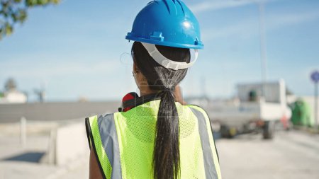 Photo for African american woman builder wearing hardhat at street - Royalty Free Image