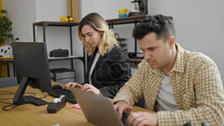 Photo for Man and woman business workers working together at office - Royalty Free Image