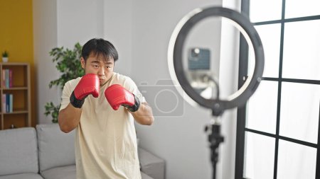 Photo for Recording video tutorial boxing at home - Royalty Free Image