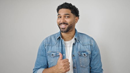 Photo for African american man smiling confident doing ok gesture over isolated white background - Royalty Free Image