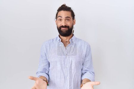 Photo for Hispanic man with beard wearing casual shirt clueless and confused with open arms, no idea concept. - Royalty Free Image